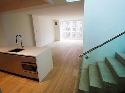 Photo of the kitchen with stairs to the terrace