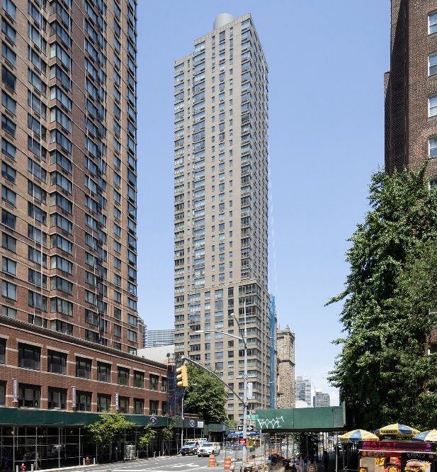 Street photo of the 2 Columbus Avenue showing the building from the street to the sky.