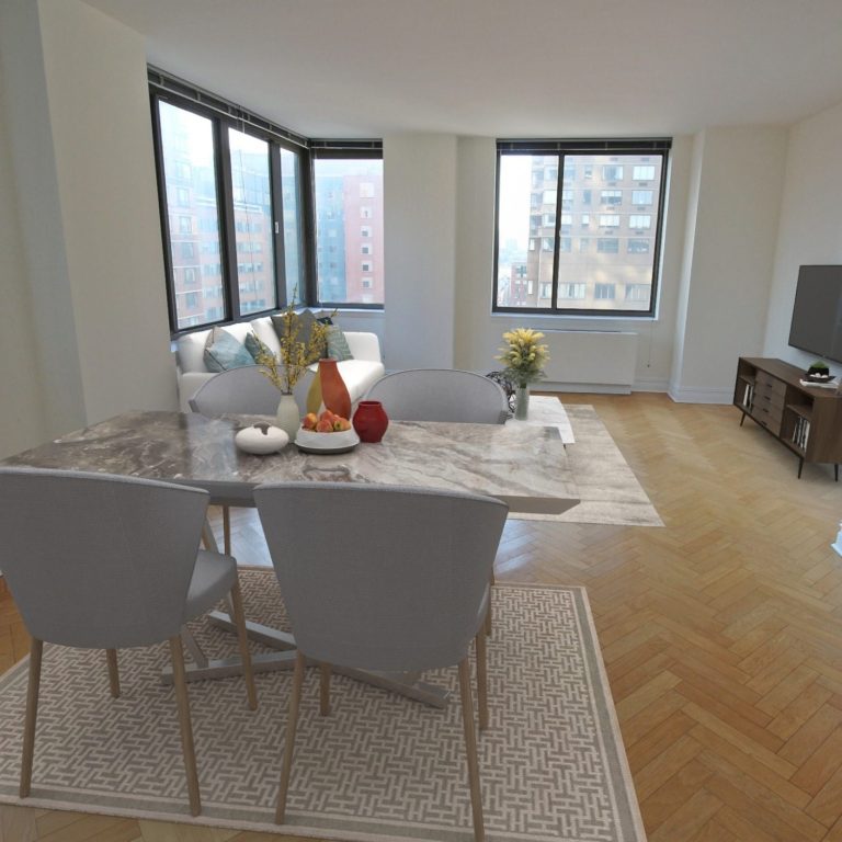 Living Room at 2 Columbus Avenue -- nice with many windows.