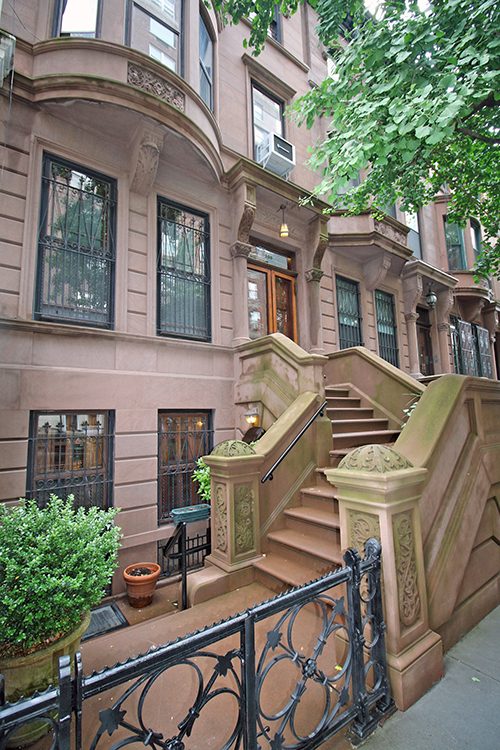 The fron facade of the brownstone at 308 W. 81st Street, showing the stairs and the facade.