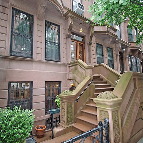 Charming front of the brownstone at 81st Street, showing the front stairs and the 4th floor facade.